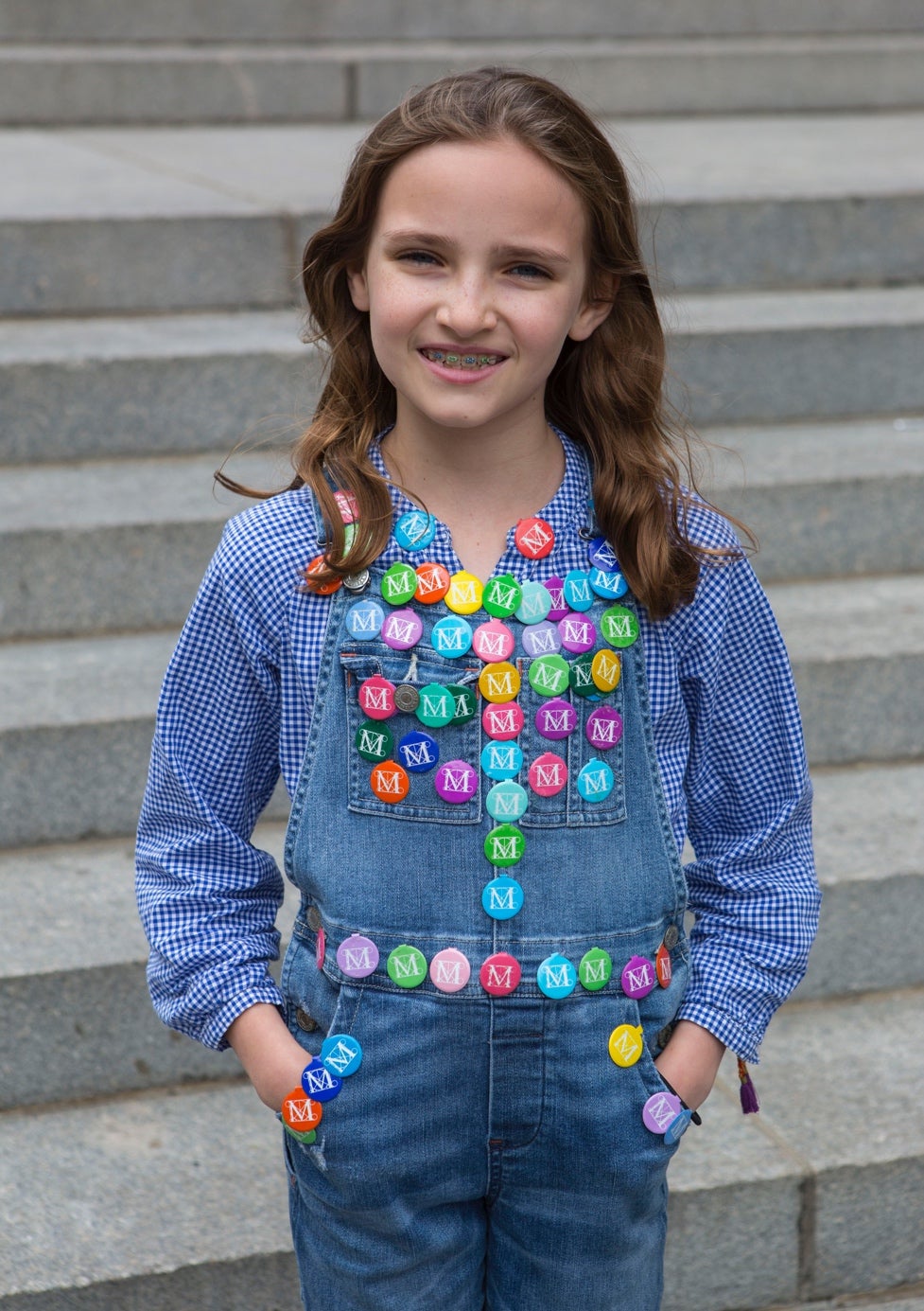 Mary Stufano shows off her favorite collection of metal admission tags from the Metropolitan Museum of Art in New York City. They switched to paper in 2013